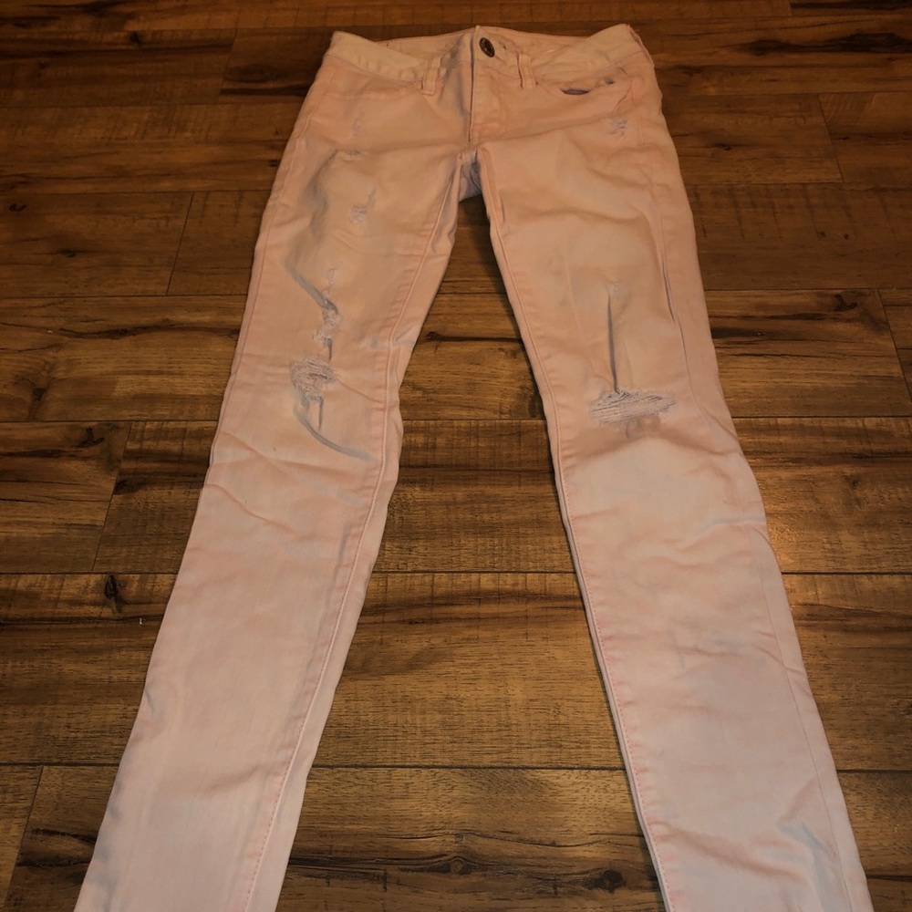 Light pink American eagle jeans.